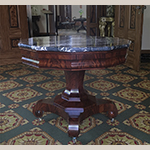 Fig. 21: Dodecagonal center table with conforming apron and marble top, attributed to Joseph Meeks & Sons, ca.1835–1845, New York, NY. Mahogany and mahogany veneer with maple, Egyptian marble, and brass; HOA: 29-3/4”, DIA: 36-1/2”. Collection of Preservation Greensboro, Acc. 2002.026.001; Gift of John Walker Fry Rucker Jr.